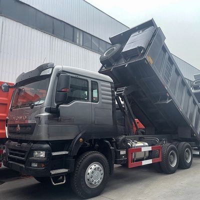 kupować Używane/ Narodowe ciężkie ciężarówki HOWO TX Ciężarówka z wyciągiem 400 koni mechanicznych 8X4 6X4 Ciężarówka do zrzucania odpadów online manufacture