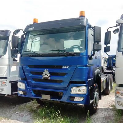 kupować Używany Sinotruck HOWO 371 380 400 430HP 6X4 głowica ciągnika z ręczną skrzynią biegów online manufacture
