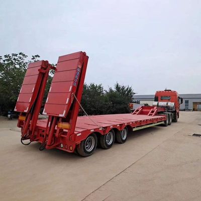 Dobra cena. Półnaczepa o niskim łóżku z hydrauliczną drabiną 3-osiową i automatycznymi rampami o pojemności ładunkowej 40T-100T w RPA w Internecie